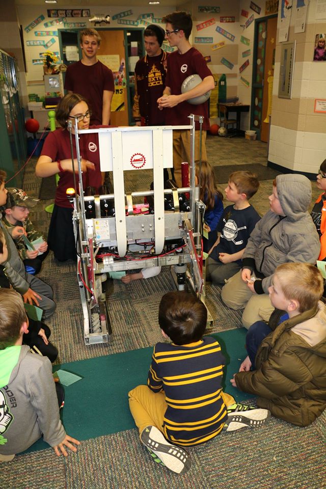 kids crowd around our robot