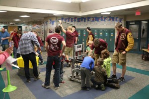 kids getting a close look at our robot