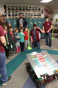 kids watch a our robot is driven