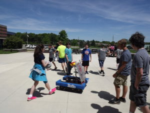 Robot outside with students