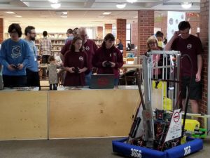 two female students driving our robot